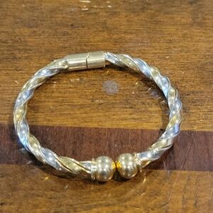Elegant Gold and Silver Twist Bracelet
